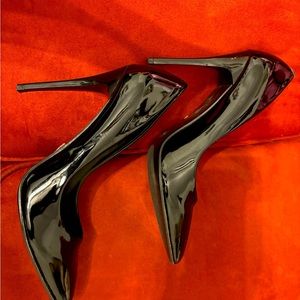 Black patent leather pumps